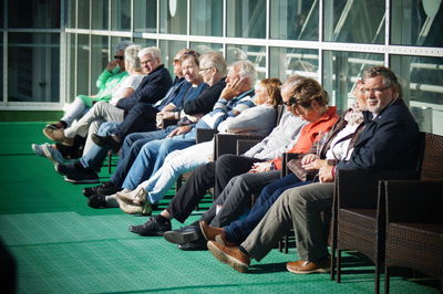 People sitting on chairs