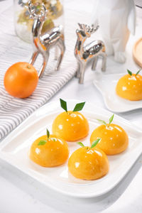 High angle view of orange fruits on table