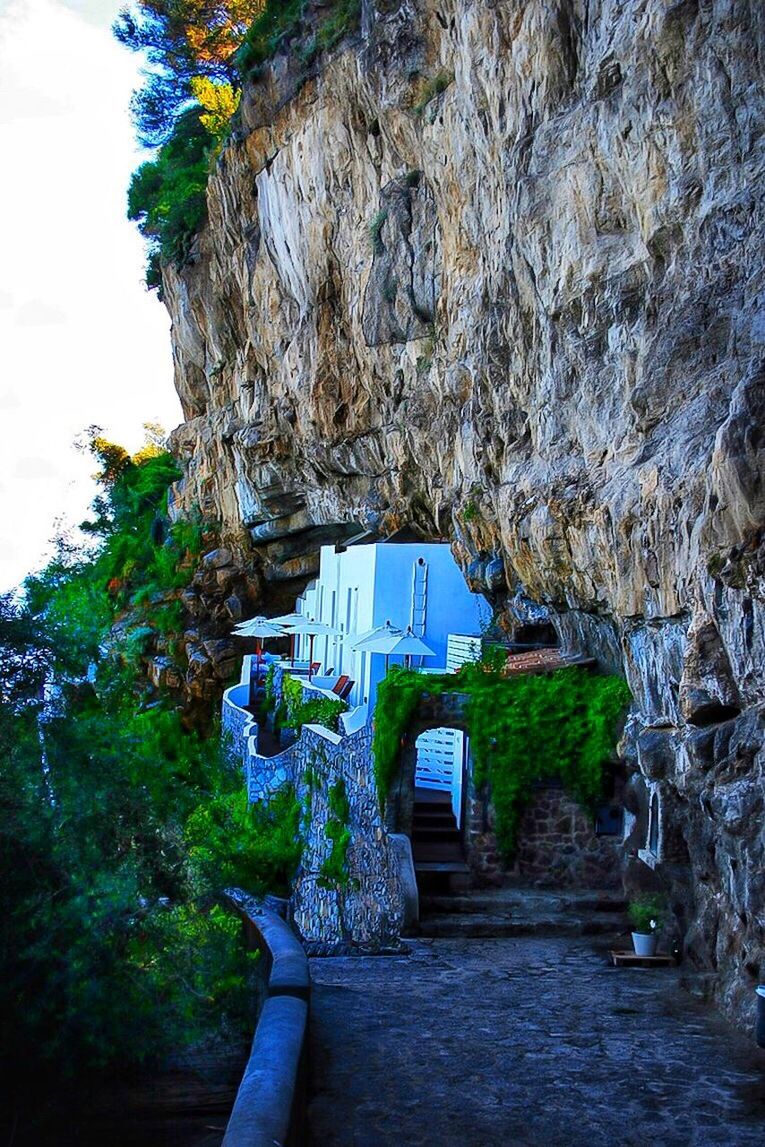 architecture, built structure, building exterior, plant, day, building, nature, no people, solid, history, the past, rock, outdoors, tree, rock - object, growth, old, house, rock formation, sky, ruined