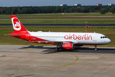 View of airplane at airport runway