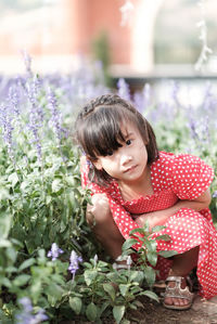 Portrait of a girl with pink flowers