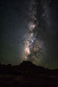 Scenic view of silhouette mountain against star field at night in big bend national park - texas
