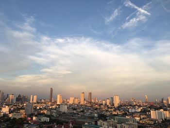 Modern buildings in city against sky