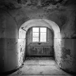 Closed window of abandoned building