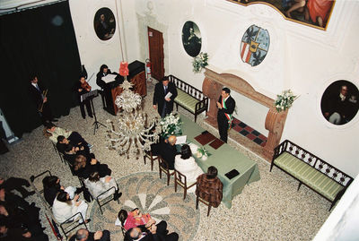 High angle view of people on table