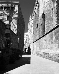 Narrow street along buildings