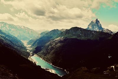 Scenic view of snowcapped mountains against sky