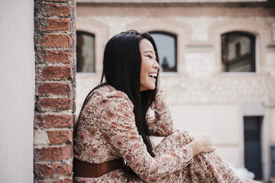 Young woman looking away outdoors