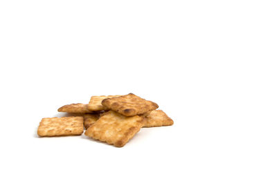 Close-up of cookies against white background