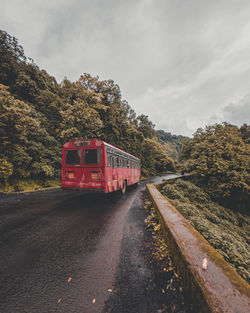 Train on railroad track against sky