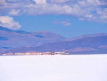 Scenic view of snowcapped mountains against sky