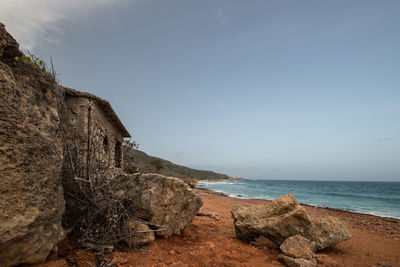 Scenic view of sea against blue sky