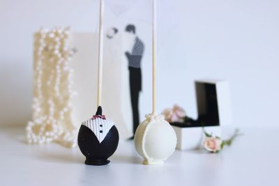 Close-up of stuffed toy hanging on table