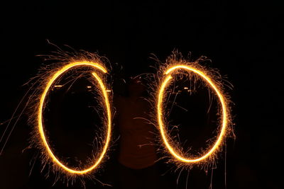 Close-up of illuminated firework display at night