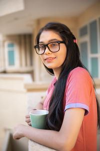 Young woman using mobile phone