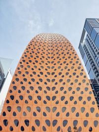 Low angle view of modern building against sky