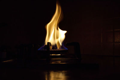 Close-up of burning candle