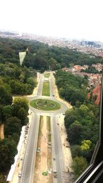 High angle view of cars on road against sky