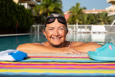 Portrait of smiling man in swimming pool