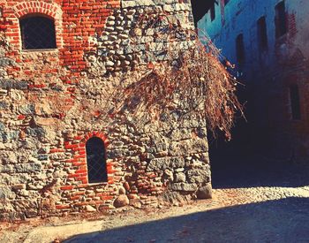 Graffiti on wall of old building