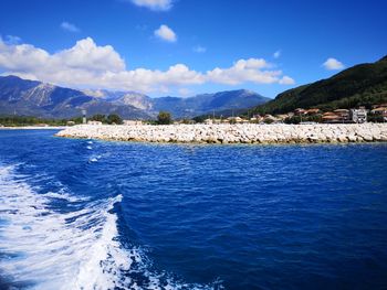 Scenic view of sea against blue sky