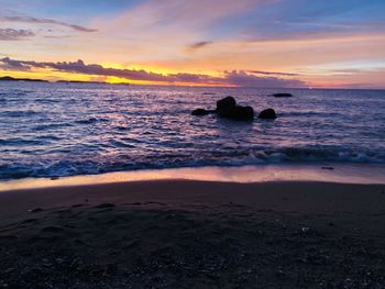 Scenic view of sea against sky during sunset