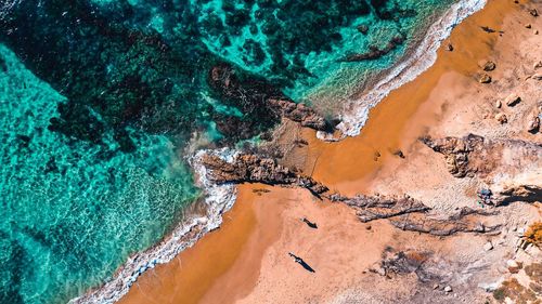 High angle view of rocks on beach