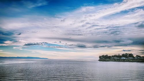 Scenic view of sea against sky at sunset
