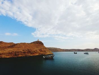 Scenic view of bay against sky