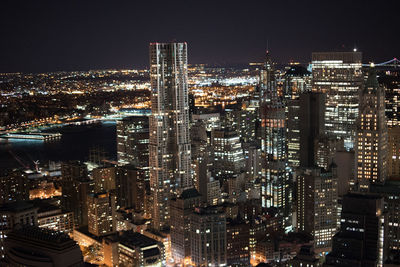 Illuminated cityscape at night