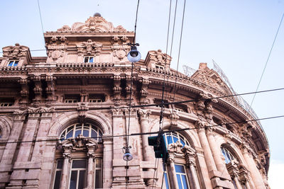 Low angle view of the stock exchange palace palazzo della nuova borsa valori in genova against sky