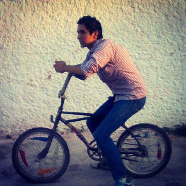 bicycle, full length, lifestyles, leisure activity, casual clothing, transportation, mode of transport, side view, person, land vehicle, childhood, boys, street, elementary age, holding, riding, standing, day
