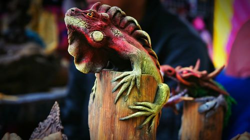 Close-up of lizard statue of wood