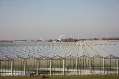 Built structure on field against clear sky