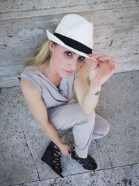 Young woman wearing hat