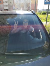 Young woman in car