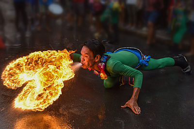 A skilled firebreather and fire eater.