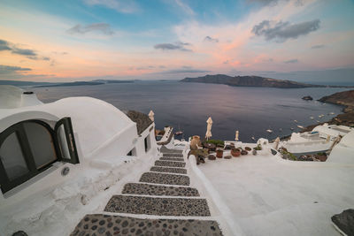 High angle view of sea against sky during sunset