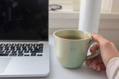 Coffee cup on table