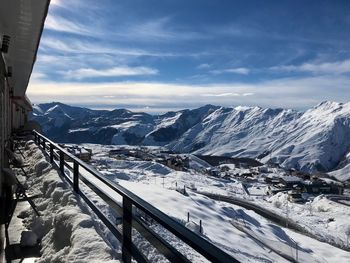 Scenic view of snowcapped mountains against sky