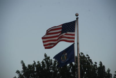 American flag against blue sky