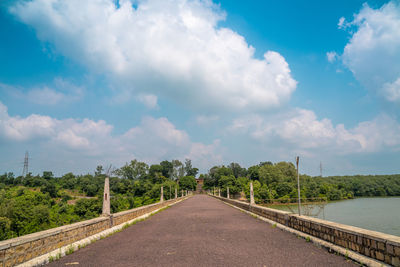 Empty road against sky
