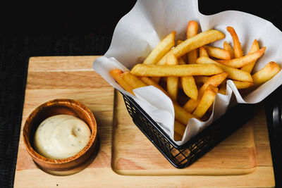 High angle view of french fries served on table