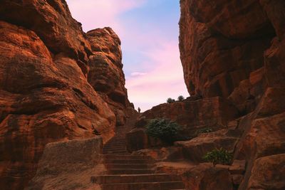 Low angle view of rock formations at sunset