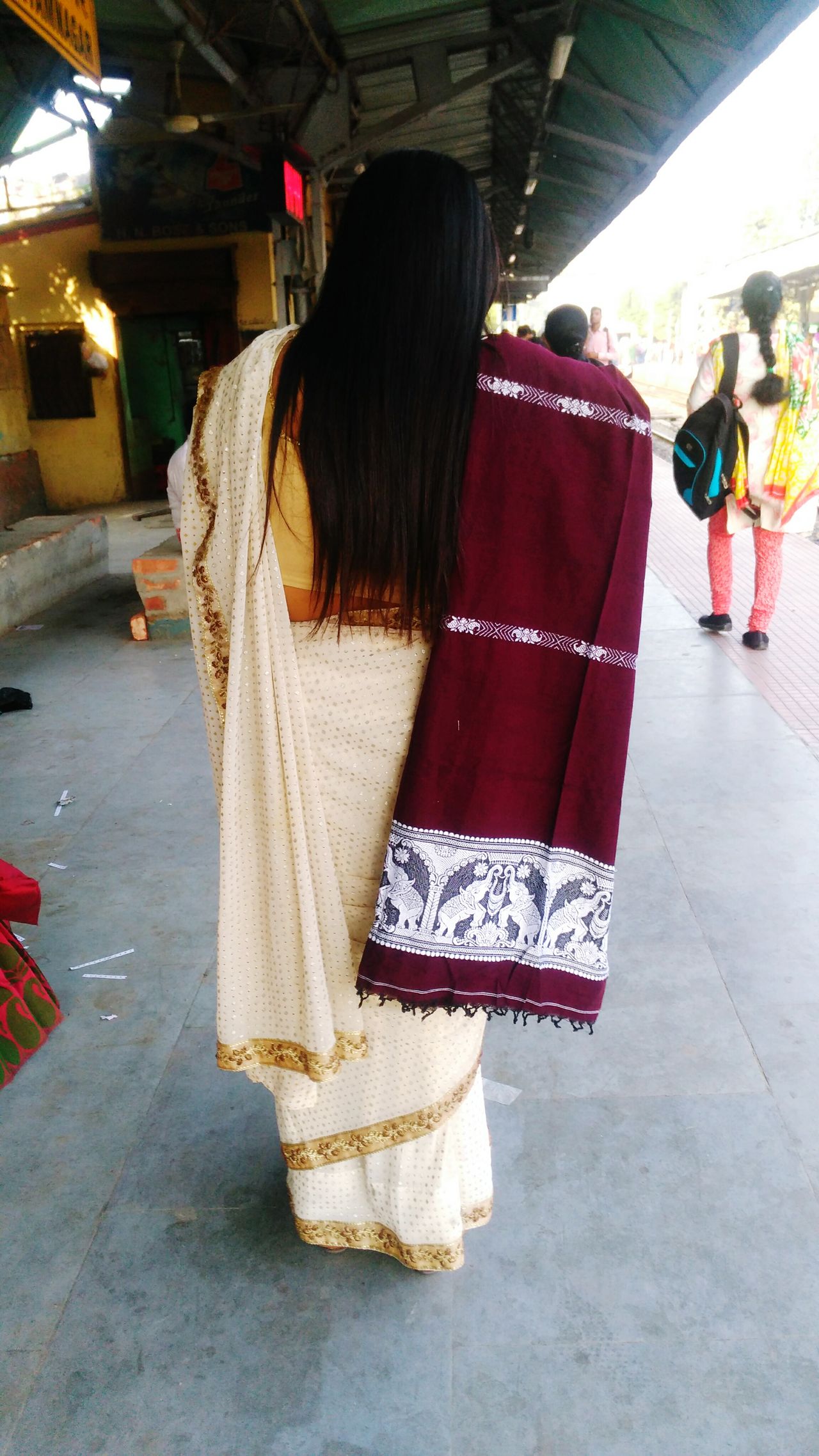 A Bengali Lady wearing Traditional Indian Saree accompanying with Shawl