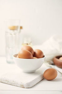 Close-up of eggs in bowl on table