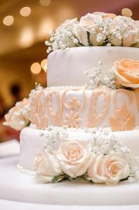 Close-up of wedding cake on table