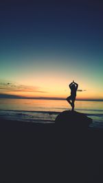 Scenic view of sea at sunset