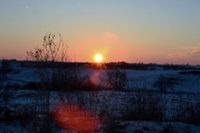 Scenic view of landscape at sunset