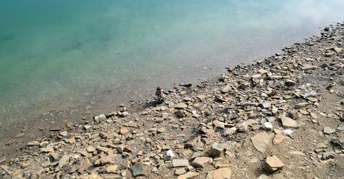 High angle view of stones on beach